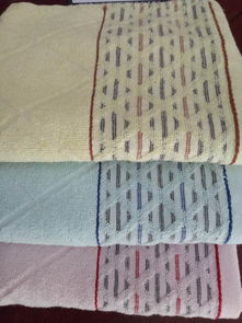 庫存加長(zhǎng)澡巾批發(fā)與一等品提花澡巾尾貨促銷 地?cái)偀徜N的毛巾便宜批發(fā)指南